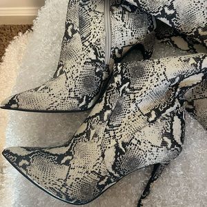 Steve Madden thigh high boots.